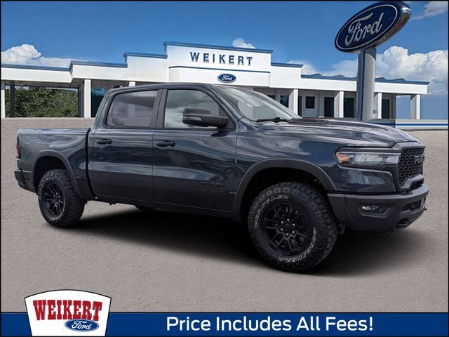 2026 RAM 1500 Rebel in Forged Blue Metallic — front three-quarter view
