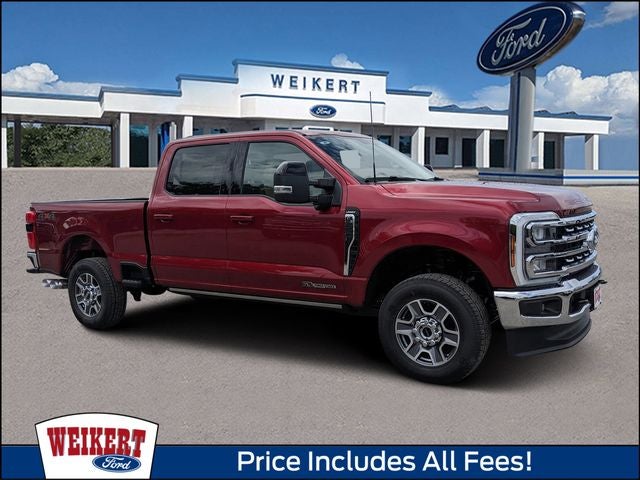 2026 Ford F-250SD Lariat in Ruby Red Metallic Tinted Clearcoat — front three-quarter view