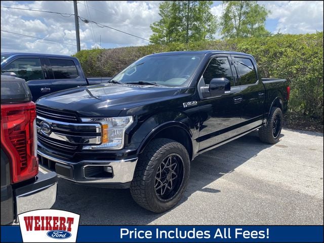 2018 Ford F-150 Lariat in Shadow Black — front three-quarter view
